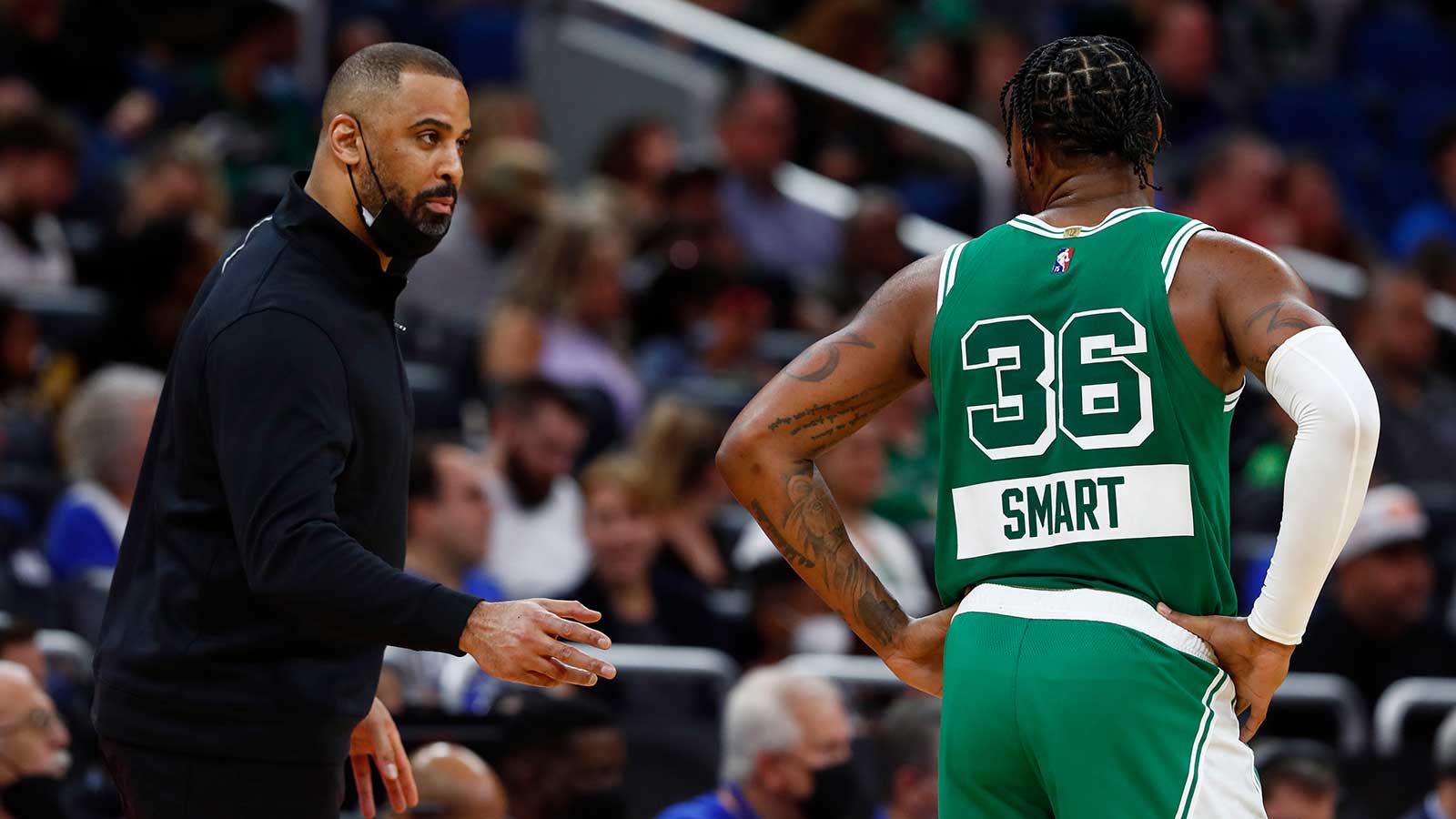 Celtics head coach Ime Udoka talks with guard Marcus Smart (36) during the first quarter against the Orlando Magic at Amway Center