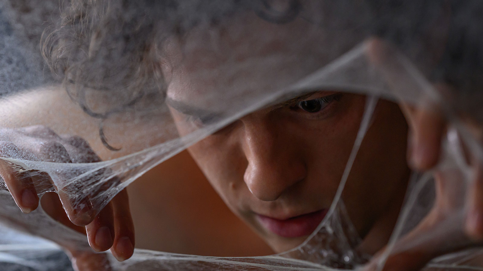 Tom Holland as Peter Parker.