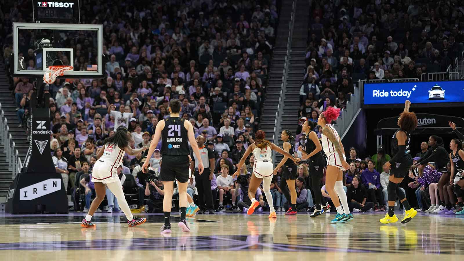 Golden State Valkyries forward Kayla Thornton (right) makes a three-point basket against the Washington Mystics during the fourth quarter at Chase Center. 