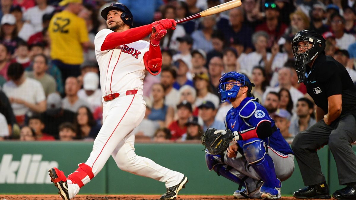 Boston Red Sox first baseman Willson Contreras (40) hits a home run during the second inning against the Texas Rangers at Fenway Park.