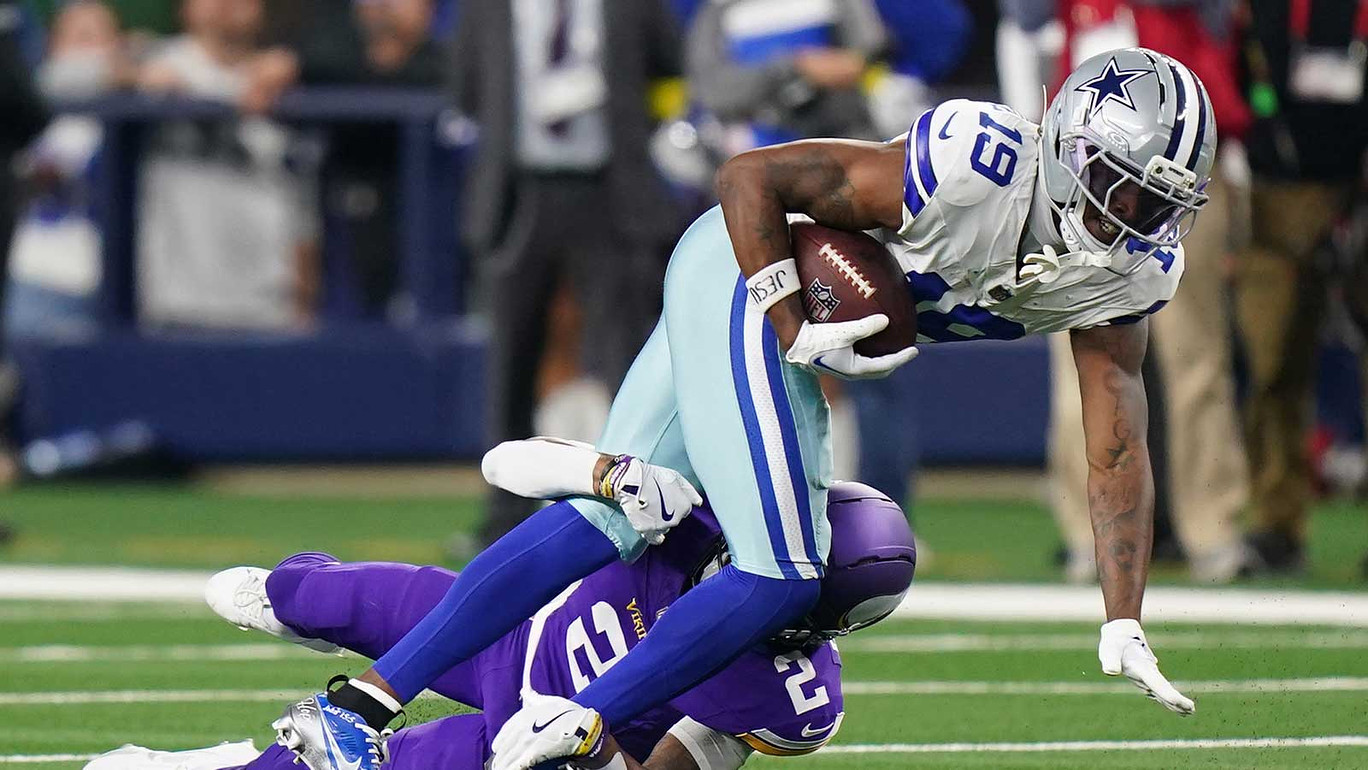 Minnesota Vikings cornerback Isaiah Rodgers (2) tackles Dallas Cowboys wide receiver Ryan Flournoy (19) during the second half at AT&T Stadium.