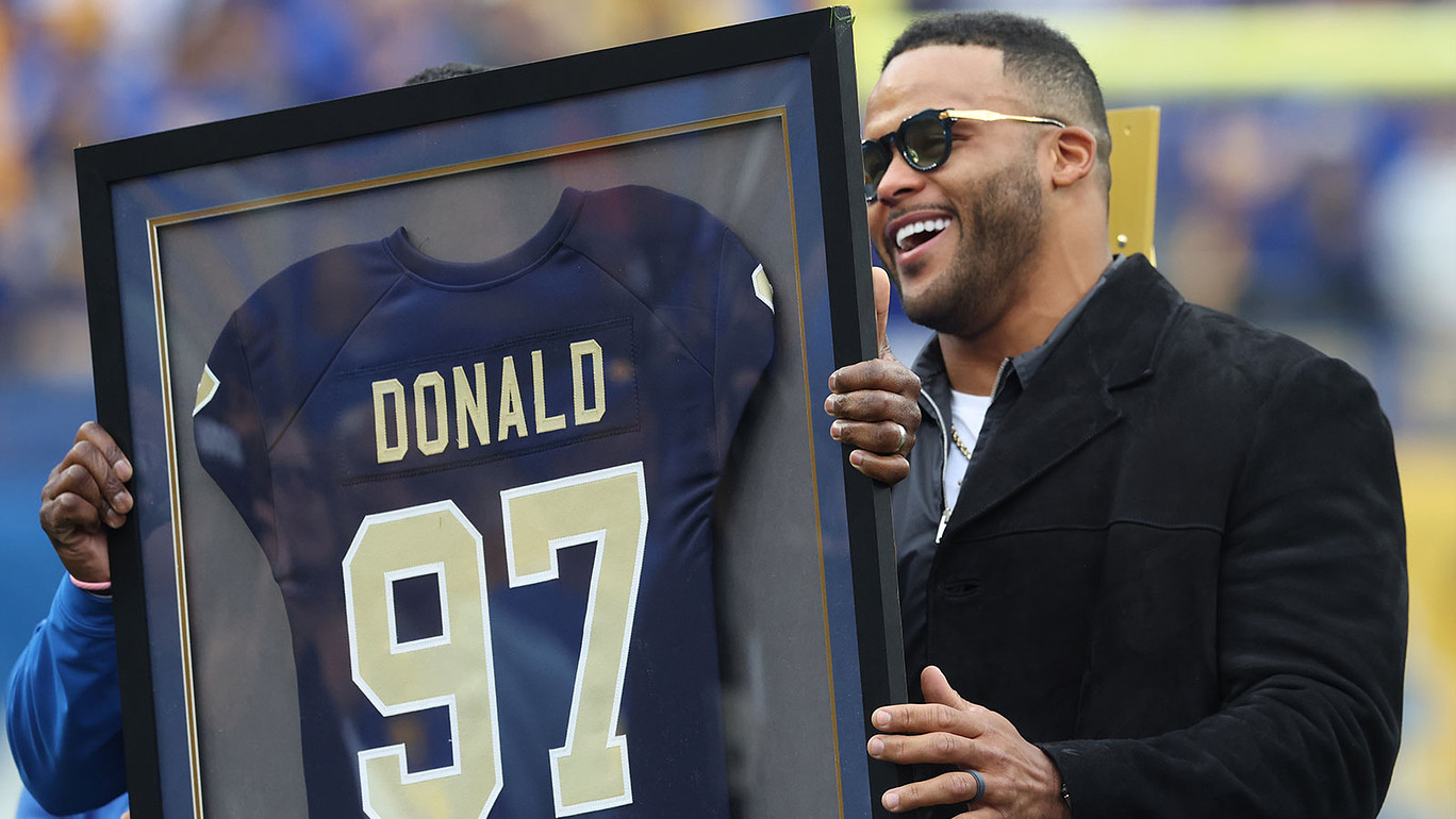 Pittsburgh Panthers former defensive end Aaron Donald (97) reacts during his jersey retirement ceremony during half-time of the game against the Notre Dame Fighting Irish at Acrisure Stadium.