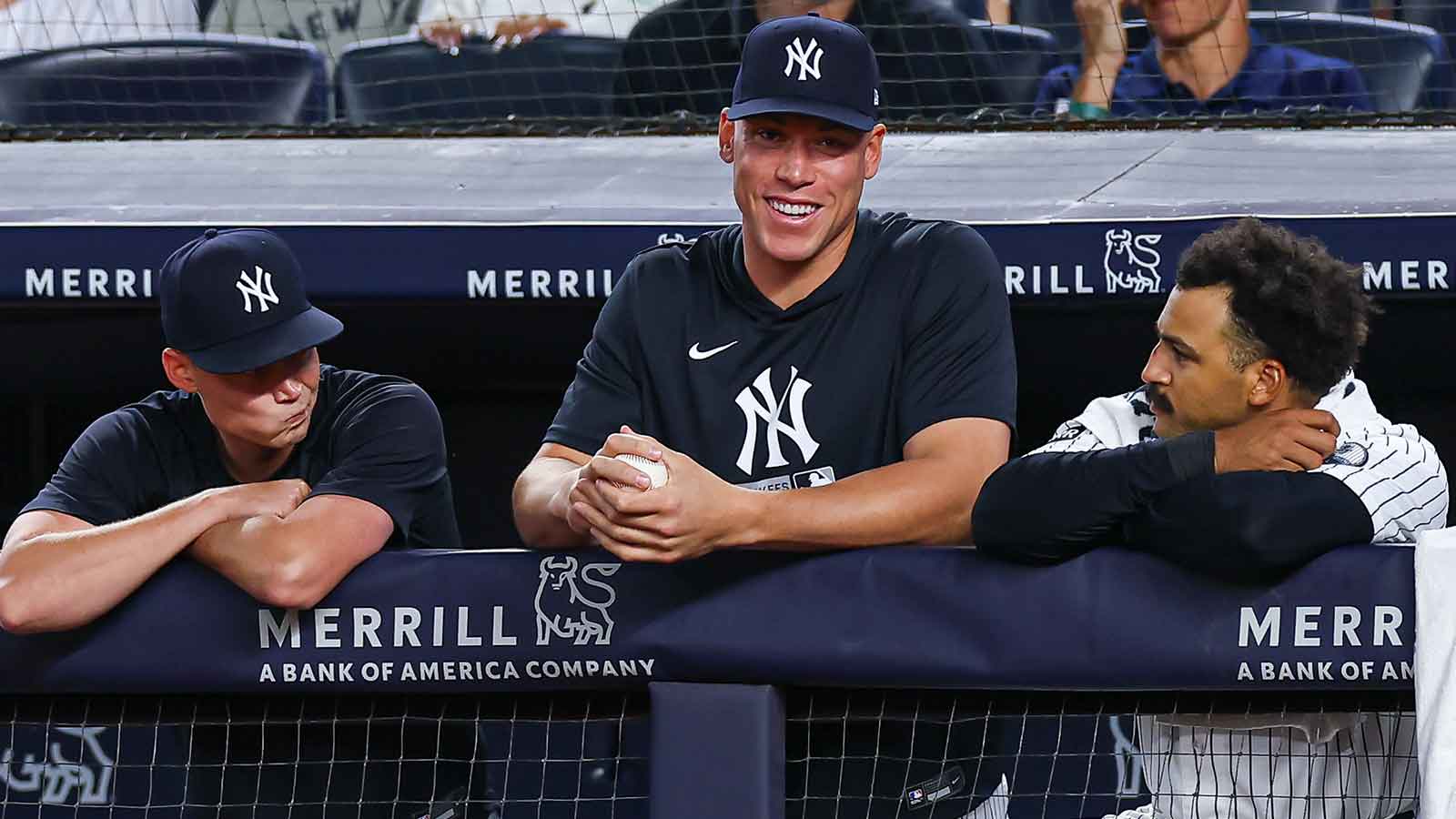 https://wp.clutchpoints.com/wp-content/uploads/2026/08/Aaron-Judge-with-teammates-in-the-Yankees-dugout.jpg