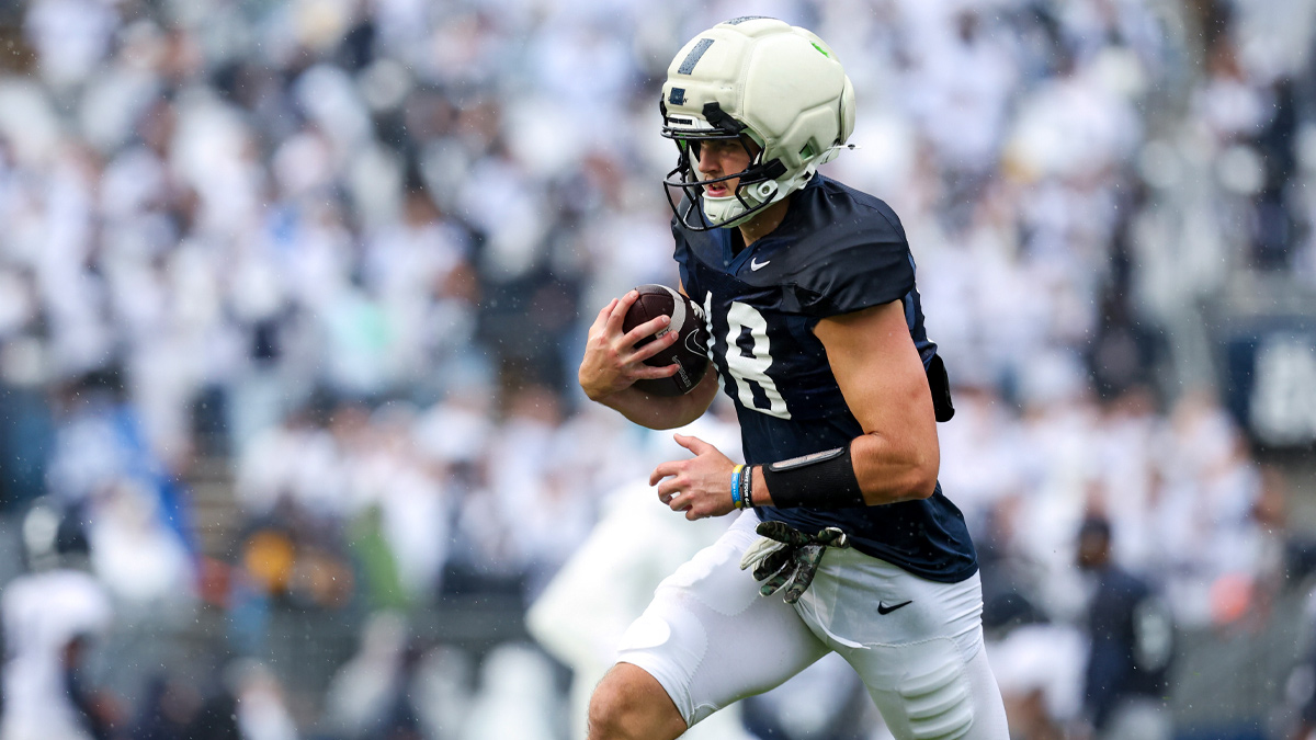Penn State Nittany Lions tight end Benjamin Brahmer (18) runs with the ball during the Penn State Blue-White Spring game at Beaver Stadium.