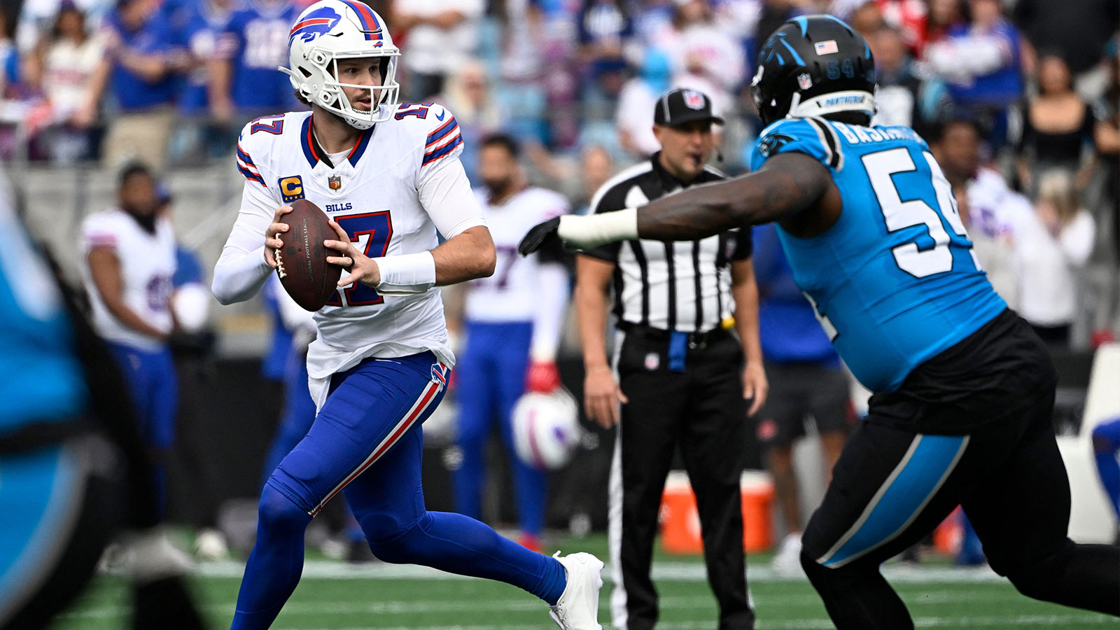 https://wp.clutchpoints.com/wp-content/uploads/2026/08/Boogie-Basham-chasing-down-Bills-QB-Josh-Allen.jpg