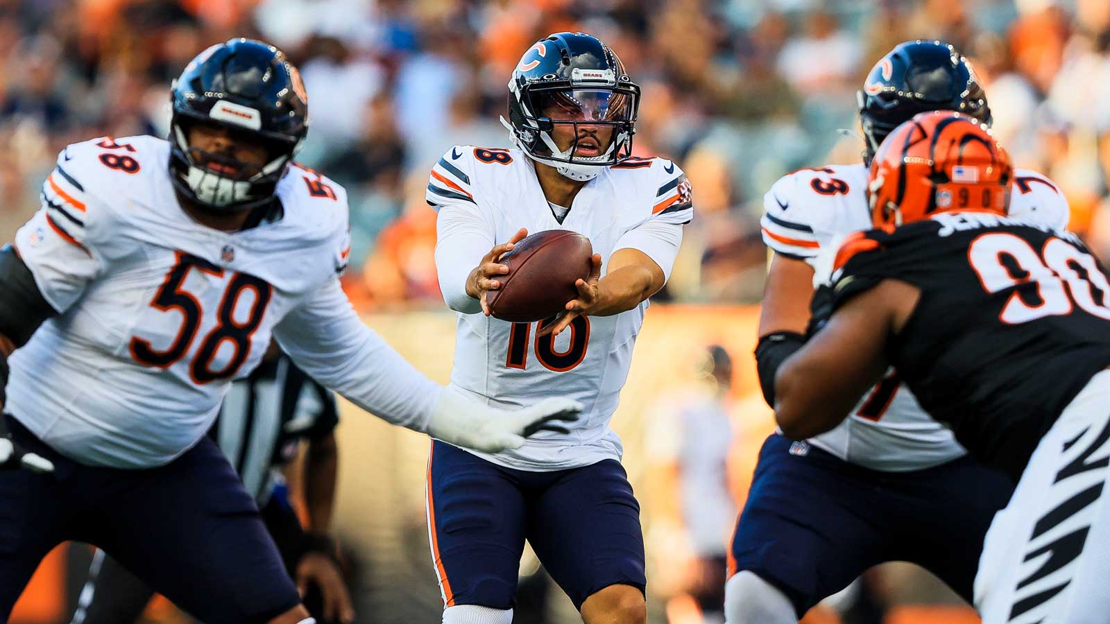 https://wp.clutchpoints.com/wp-content/uploads/2026/08/Caleb-Williams-hikes-the-football-against-the-Bengals.jpg