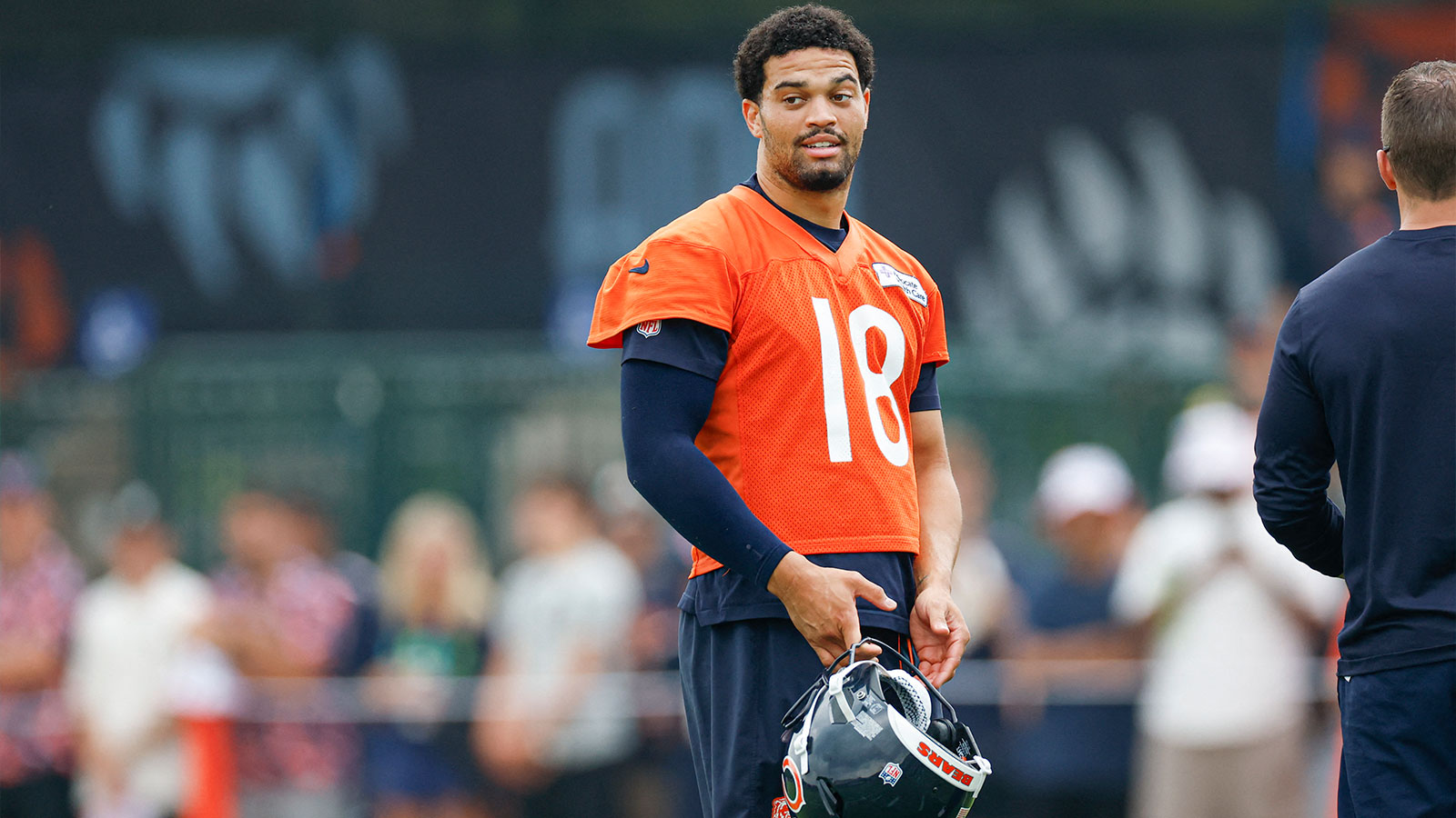 Chicago Bears quarterback Caleb Williams (18) stands on the field during training camp at Halas Hall