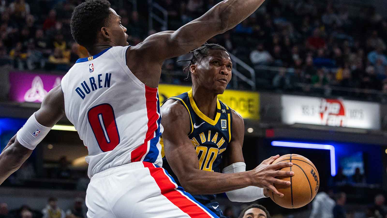 https://wp.clutchpoints.com/wp-content/uploads/2026/08/Clippers-Bennedict-Mathurin-00-shoots-vs.-Pistons-Jalen-Duren.jpg