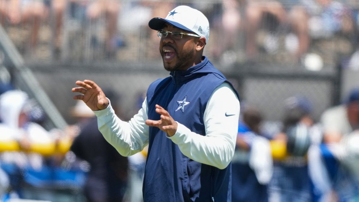 https://wp.clutchpoints.com/wp-content/uploads/2026/08/Cowboys-DC-Christian-Parker-calls-out-instructions-at-training-camp.jpg