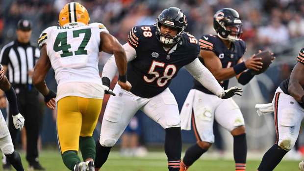 Chicago Bears offensive lineman Darnell Wright (58) blocks against the Green Bay Packers at Soldier Field.