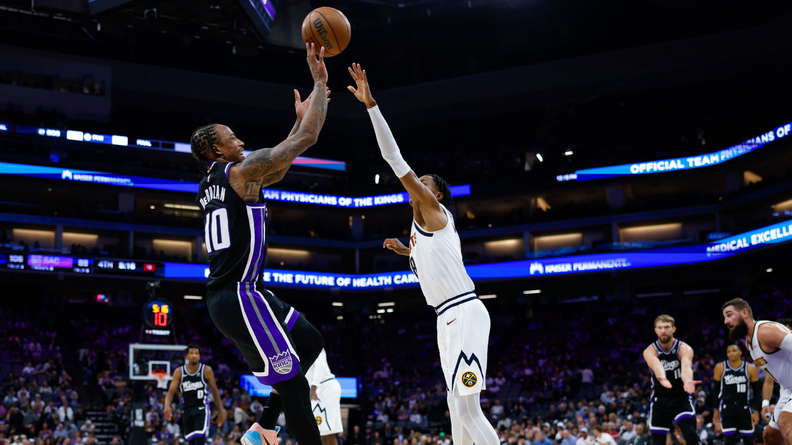 https://wp.clutchpoints.com/wp-content/uploads/2026/08/DeMar-DeRozan-shooting-over-Peyton-Watson.jpg