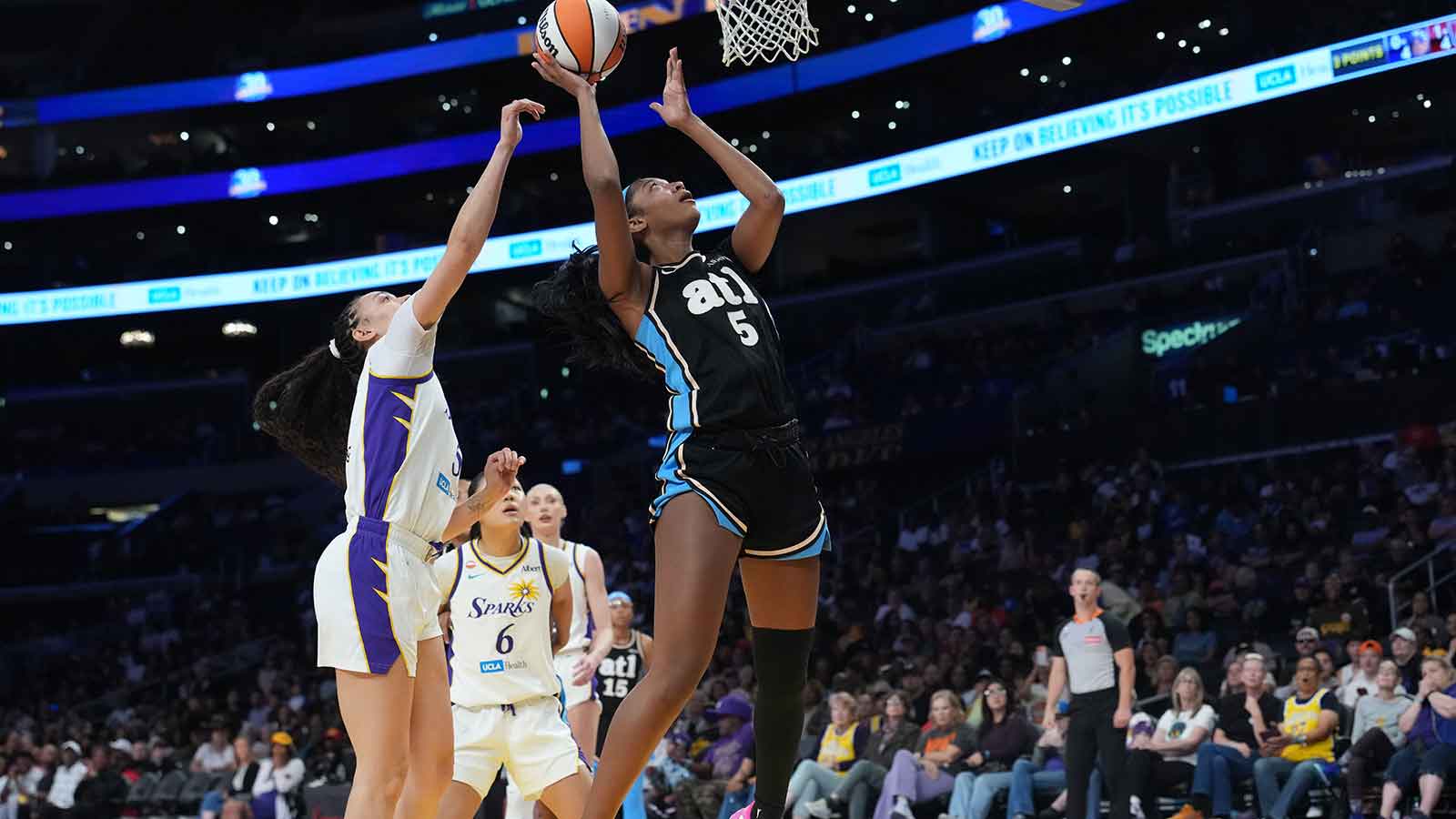 Dream fans give Angel Reese her flowers for historic performance vs. Sparks