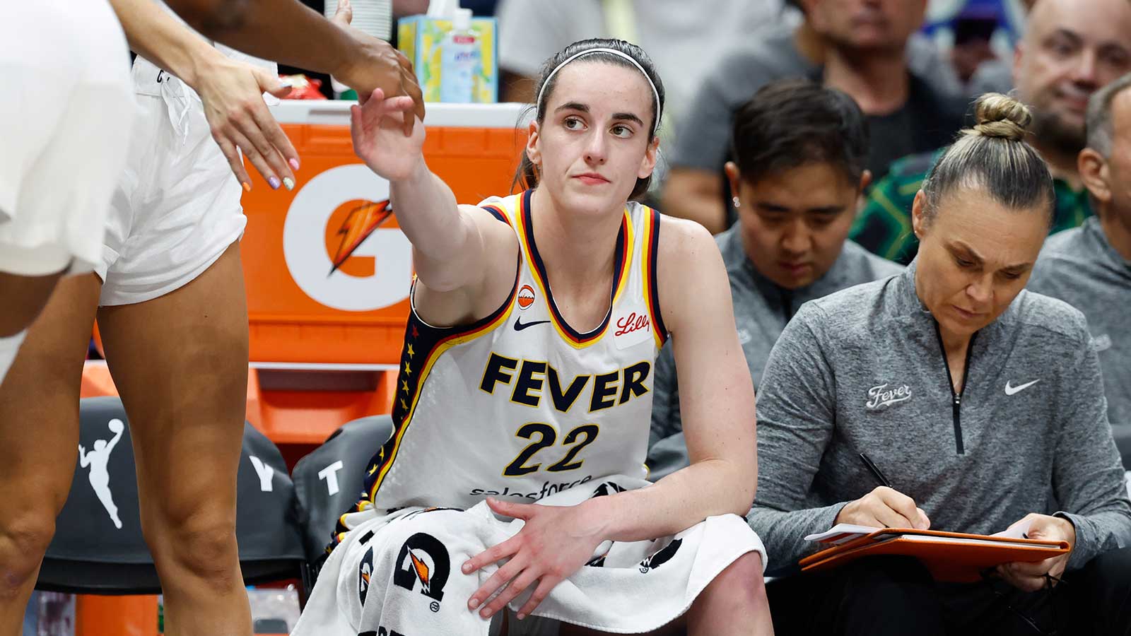 https://wp.clutchpoints.com/wp-content/uploads/2026/08/Fever-guard-Caitlin-Clark-22-reacts-on-the-bench.jpg