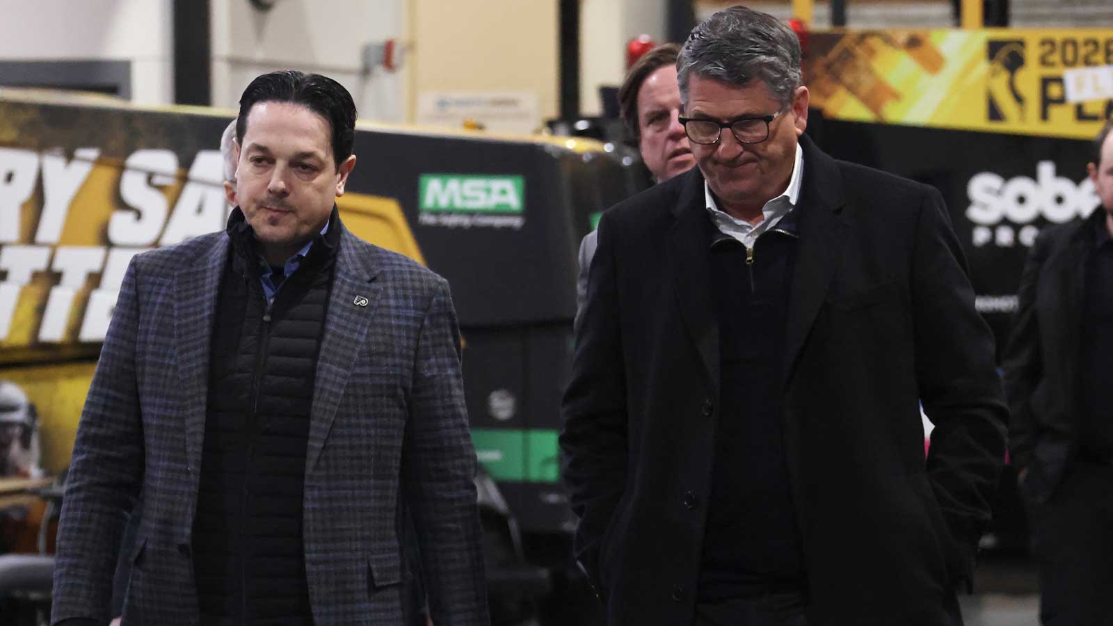 Philadelphia Flyers General Manager Danny Briere (left) and President of Hockey Operations Keith Jones (right) after the Flyers defeated the Pittsburgh Penguins in game two of the first round of the 2026 Stanley Cup Playoffs at PPG Paints Arena. 