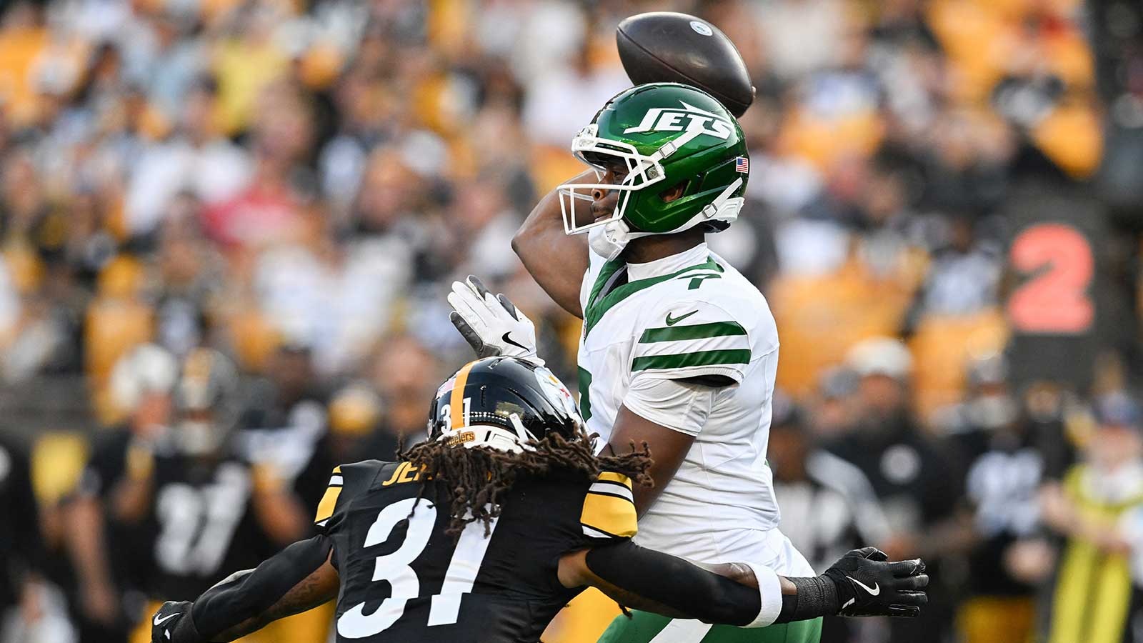 https://wp.clutchpoints.com/wp-content/uploads/2026/08/Geno-Smith-is-pressured-by-Rayshawn-Jenkins.jpg