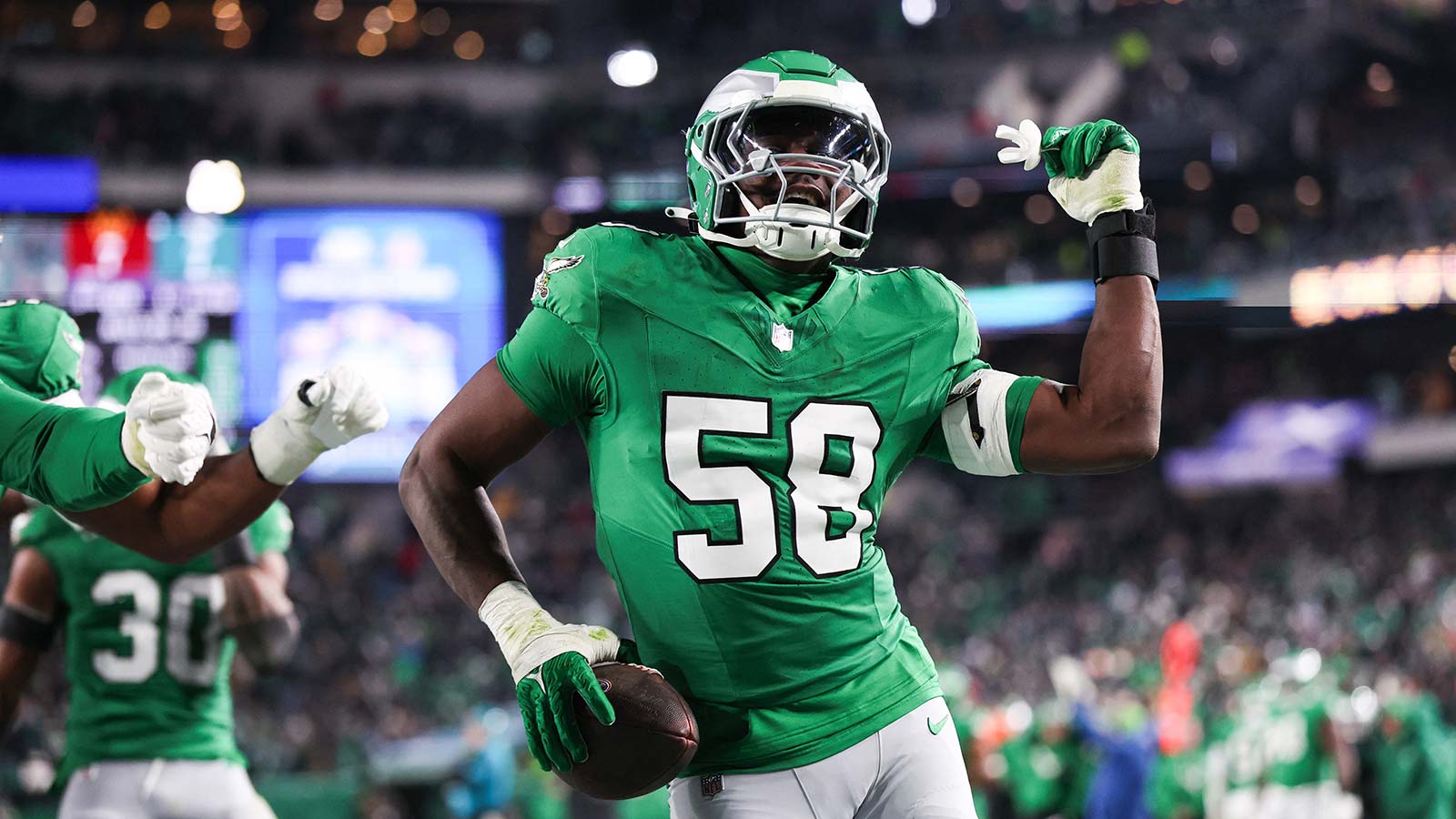 Philadelphia Eagles linebacker Jalyx Hunt (58) celebrates an interception during the second quarter against the Washington Commanders at Lincoln Financial Field. 