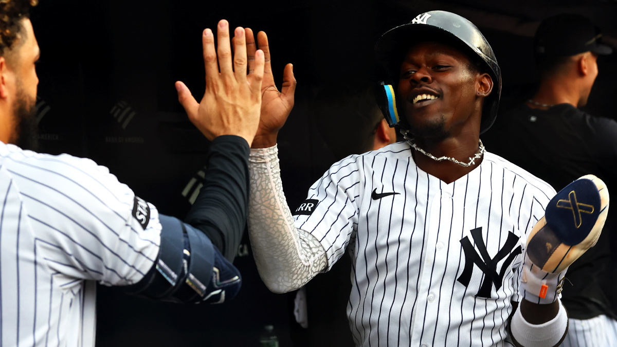 https://wp.clutchpoints.com/wp-content/uploads/2026/08/Jazz-Chisholm-Jr-celebrates-in-Yankees-dugout.jpg