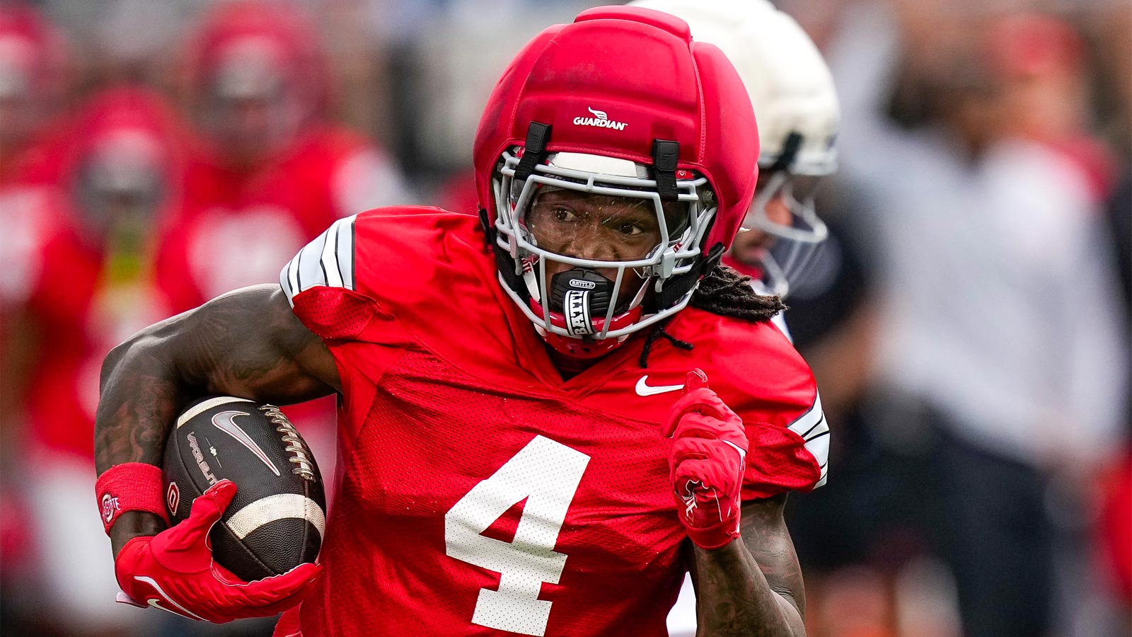 Ohio State Buckeyes wide receiver Jeremiah Smith (4) takes the field during the first practice of training camp at the Woody Hayes Athletic Center on Aug. 6, 2026.