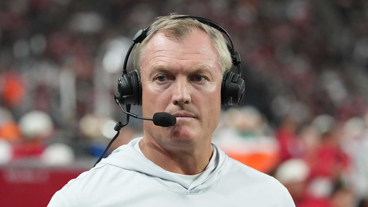 https://wp.clutchpoints.com/wp-content/uploads/2026/08/John-Lynch-with-headset.jpg