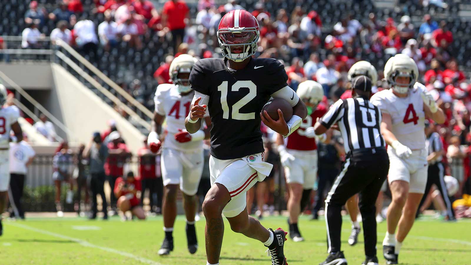 Alabama Crimson Tide quarterback Keelon Russell (12) runs the ball during the Alabama A-Day spring football scrimmage game at Saban Field at Bryant-Denny Stadium.