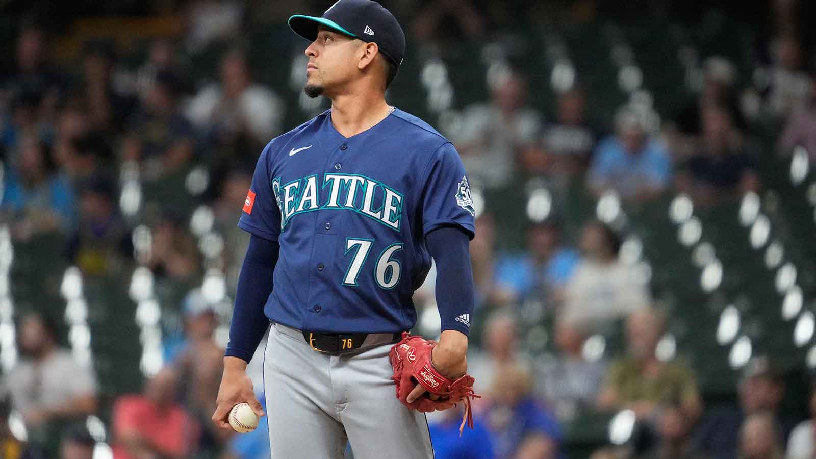 https://wp.clutchpoints.com/wp-content/uploads/2026/08/Mariners-third-baseman-Leo-Rivas-76-watches-a-home-run.jpg