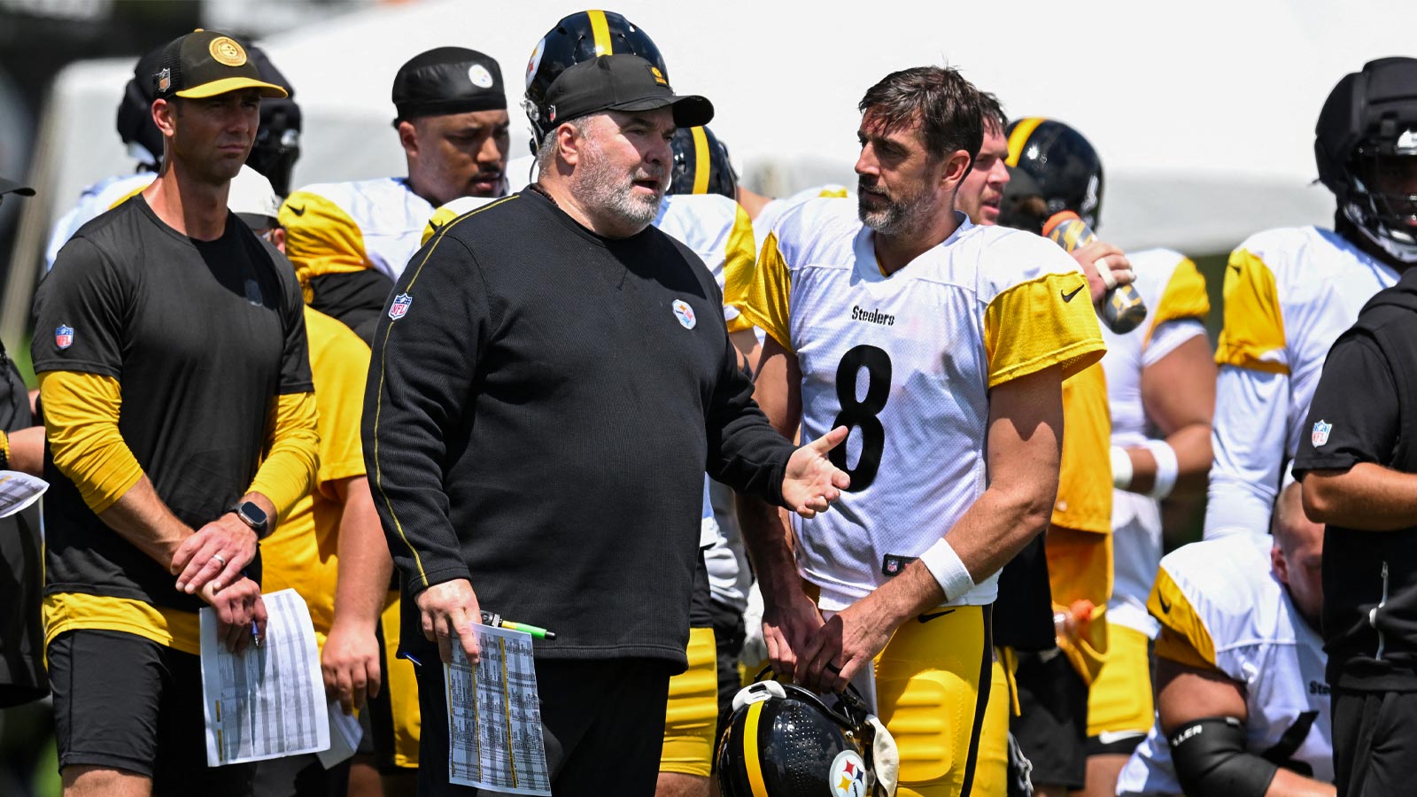 Pittsburgh Steelers head coach Mike McCarthy talks with quarterback Aaron Rodgers (8) during a practice session at Training camp at Saint Vincent College