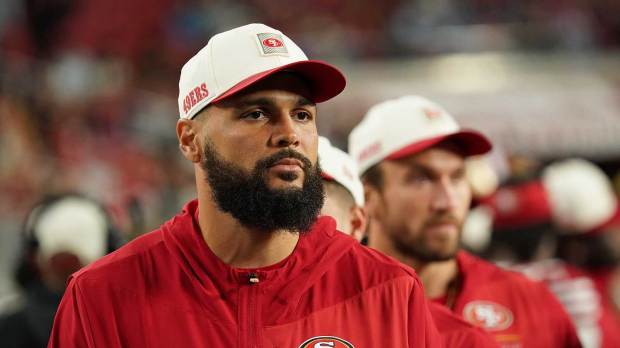 San Francisco 49ers wide receiver Mike Evans (5) watches from the sideline during a game against the Tennessee Titans in the fourth quarter at Levi's Stadium.
