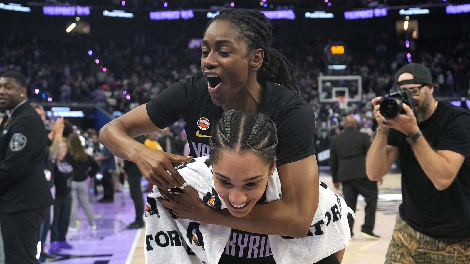 Valkyries guard Tiffany Hayes (top) is carried by forward Gabby Williams (bottom) after defeating the Washington Mystics at Chase Center. 