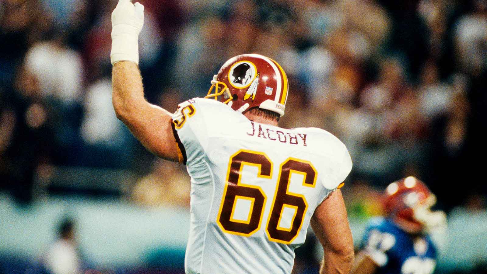 Washington Redskins offensive tackle Joe Jacoby (66) reacts after a play against the Buffalo Bills during Super Bowl XXVI at the Metrodome.