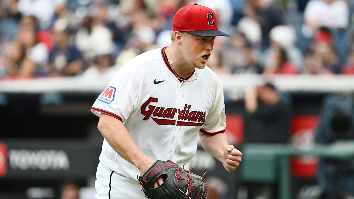 Cleveland Guardians pitcher Parker Messick (77) reacts after getting the final out of the sixth inning against the Kansas City Royals at Progressive Field.