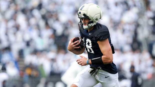 Penn State Nittany Lions tight end Benjamin Brahmer (18) runs with the ball during the Penn State Blue-White Spring game at Beaver Stadium.