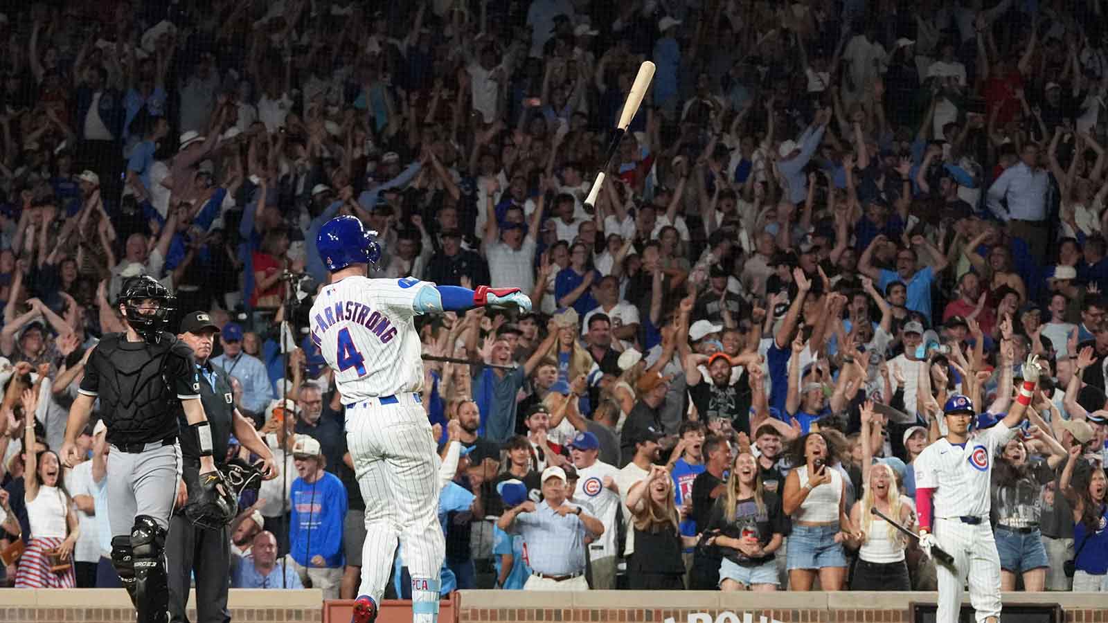 Chicago Cubs center fielder Pete Crow-Armstrong (4) hits a walk-off two-run home run against the Chicago White Sox during the tenth inning at Wrigley Field.