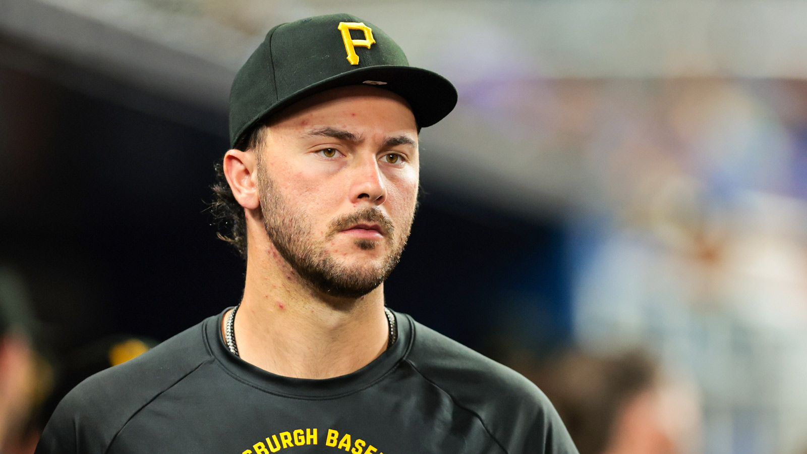 Pittsburgh Pirates pitcher Paul Skenes (30) looks on from the dugout against the Miami Marlins during the eighth inning at loanDepot Park.