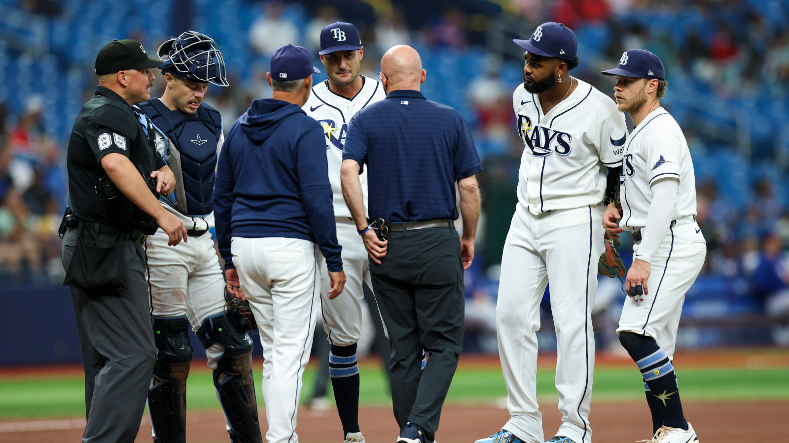 https://wp.clutchpoints.com/wp-content/uploads/2026/08/Rays-SP-Shane-McClanahan-with-teammates-and-staff.jpg