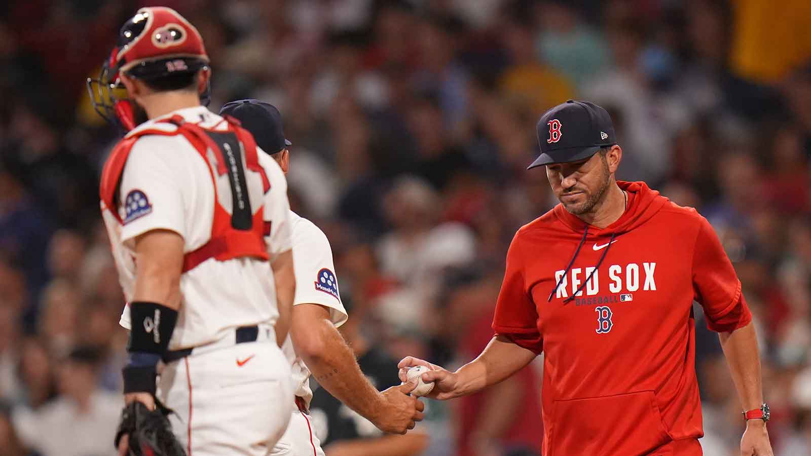 https://wp.clutchpoints.com/wp-content/uploads/2026/08/Red-Sox-interim-manager-Chad-Tracy-17-relieves-pitcher.jpg