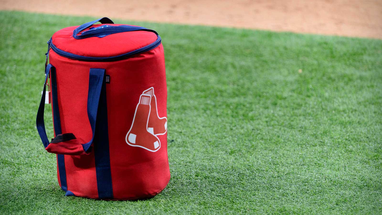 A view of the Boston Red Sox logo and a field bag during batting practice before the game between the Texas Rangers and the Boston Red Sox at Globe Life Field.