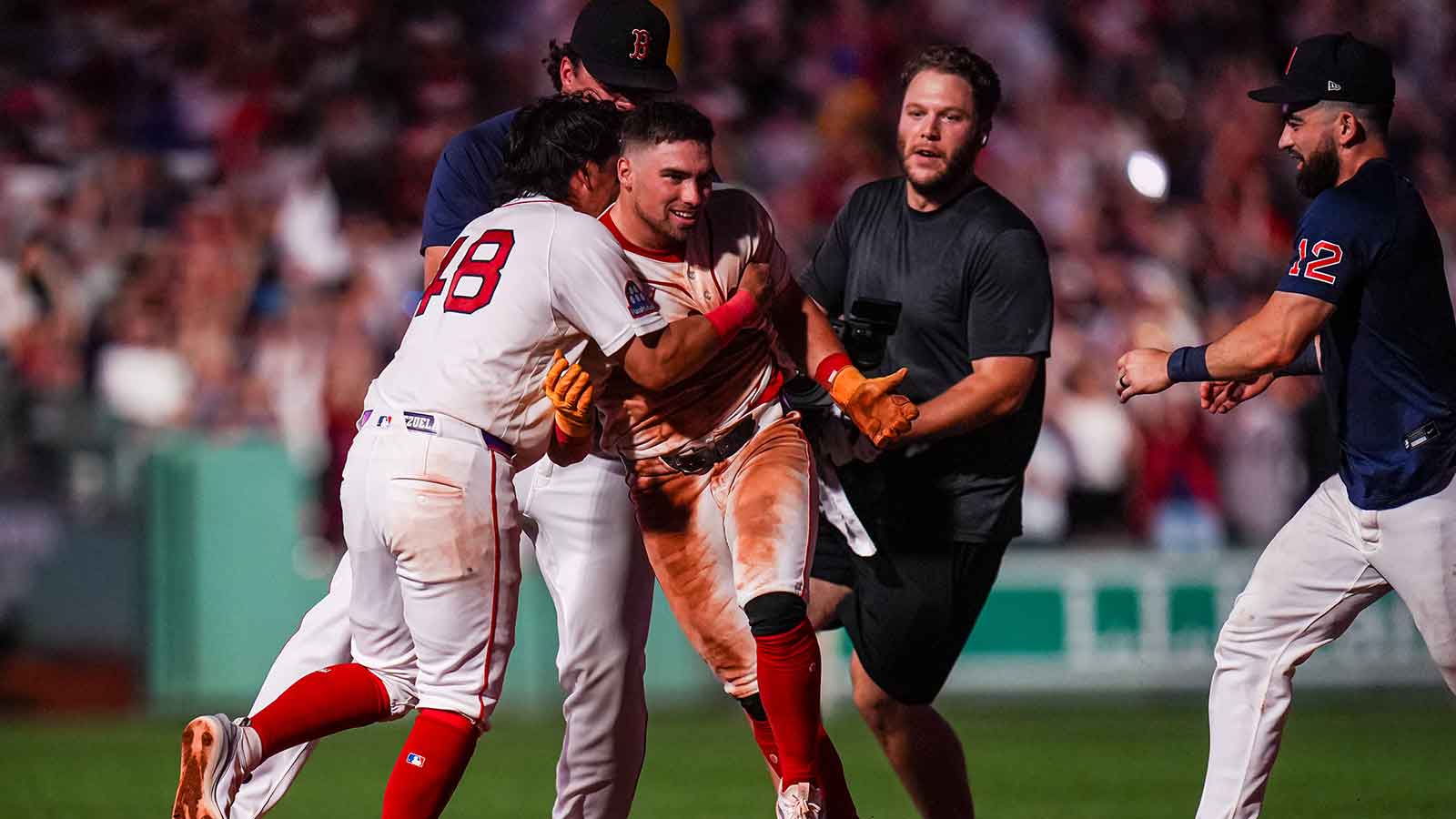 https://wp.clutchpoints.com/wp-content/uploads/2026/08/Red-Sox-third-baseman-Caleb-Durbin-5-is-congratulated-after-hitting-a-single.jpg