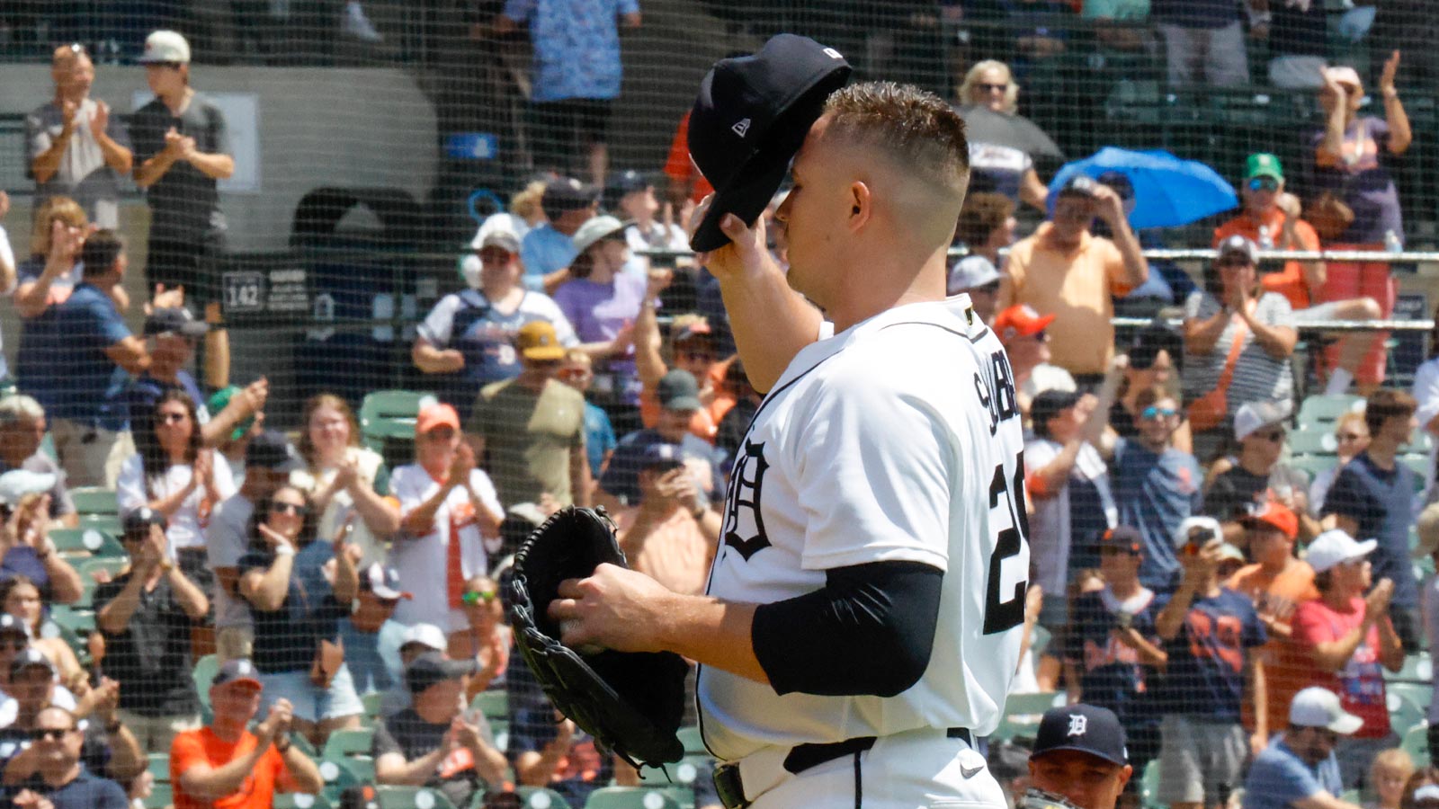 Detroit Tigers pitcher Tarik Skubal (29) tips his hat to the crown after he gets his 1000 strikes in the first inning against the Baltimore Orioles at Comerica Park.
