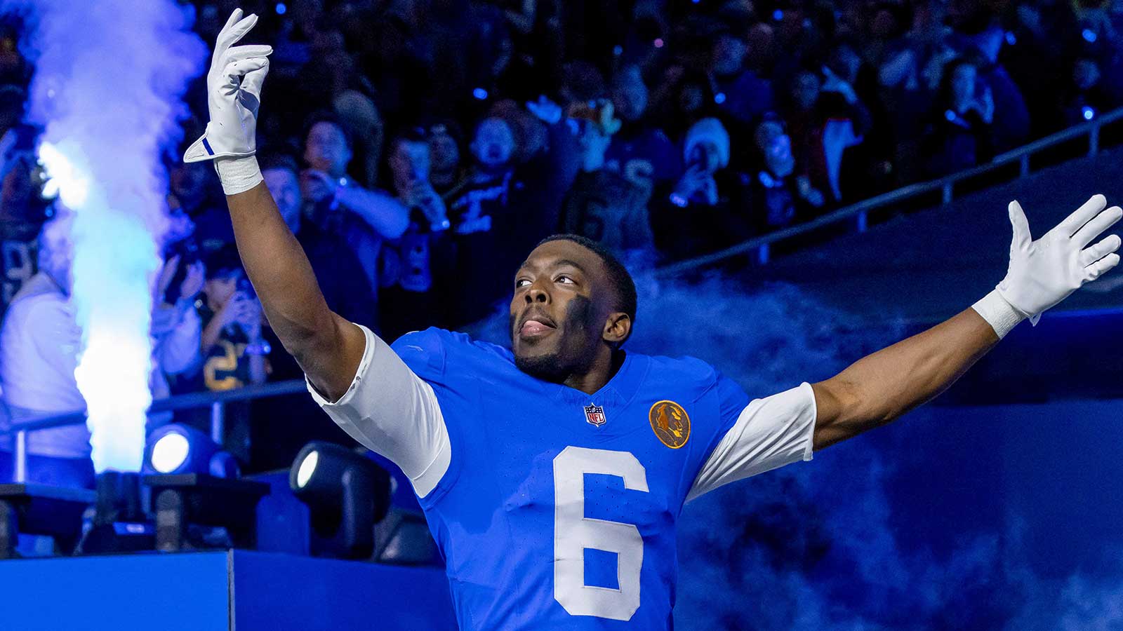 Detroit Lions cornerback Terrion Arnold (6) runs onto the field prior to the game against the Green Bay Packers at Ford Field.