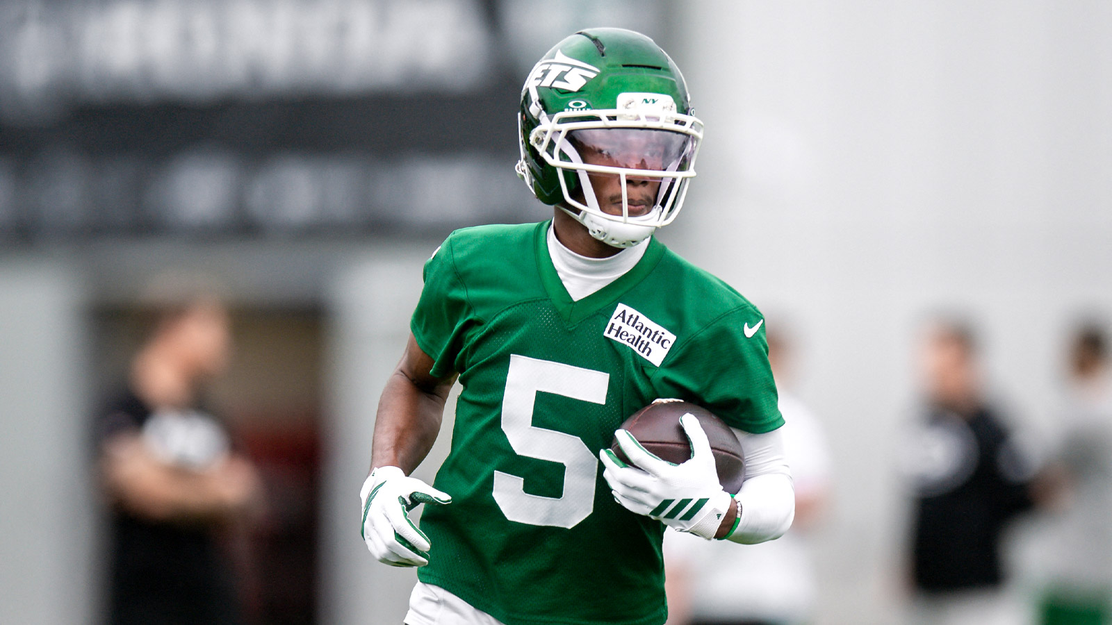 New York Jets wide receiver Garrett Wilson (5) participates in a drill during training camp at Atlantic Health Jets Training Center. 