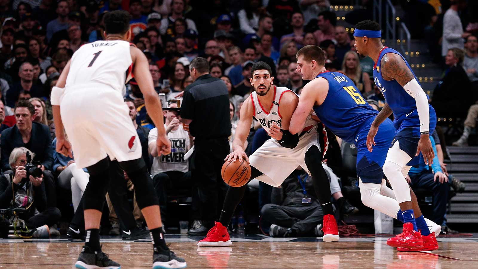 https://wp.clutchpoints.com/wp-content/uploads/2026/08/Trail-Blazers-center-Enes-Kanter-00-looks-to-guard-Evan-Turner.jpg