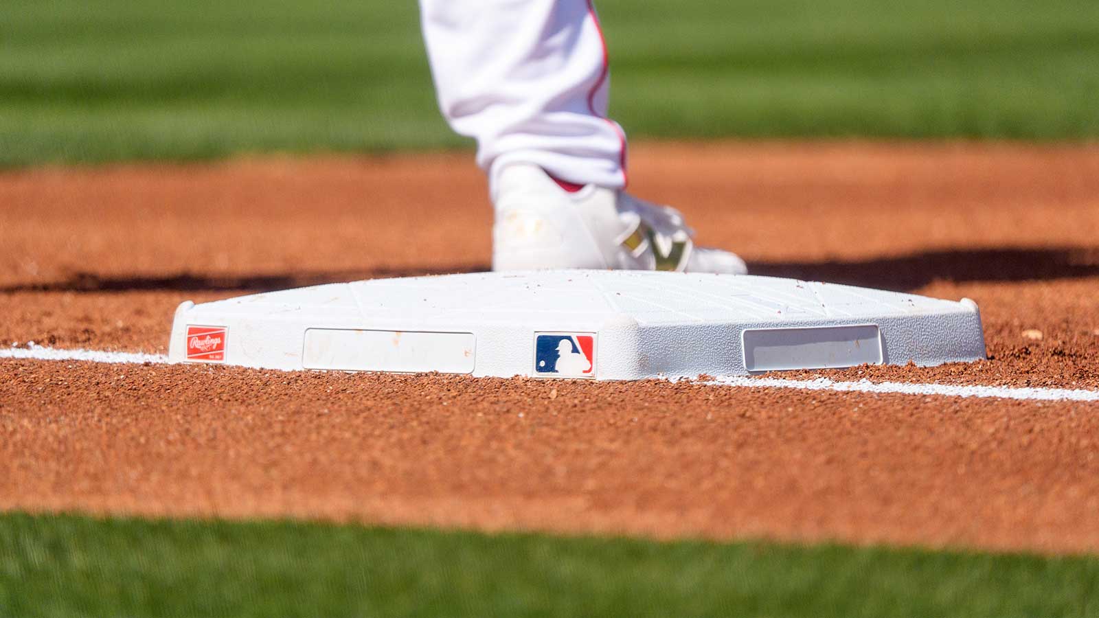 https://wp.clutchpoints.com/wp-content/uploads/2026/08/view-of-the-MLB-logo-and-first-base.jpg