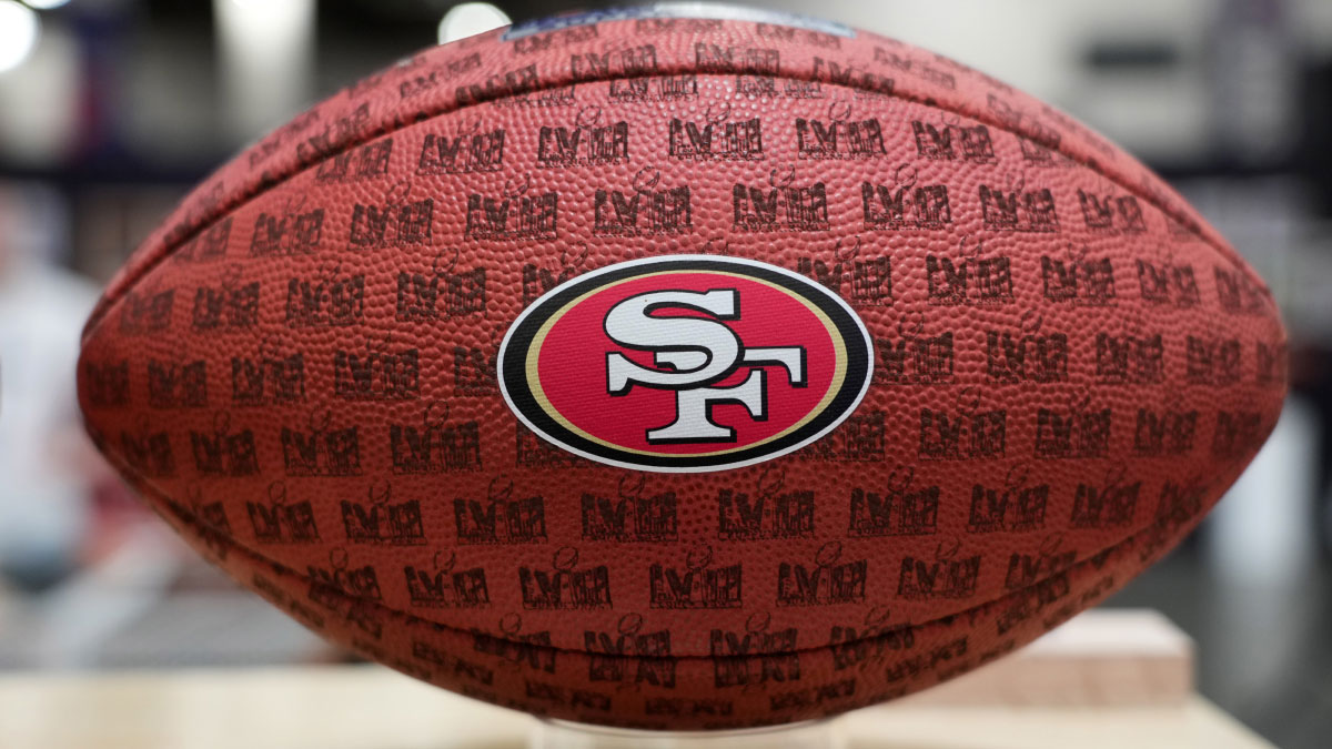 https://wp.clutchpoints.com/wp-content/uploads/2026/09/49ers-logo-on-football.jpg