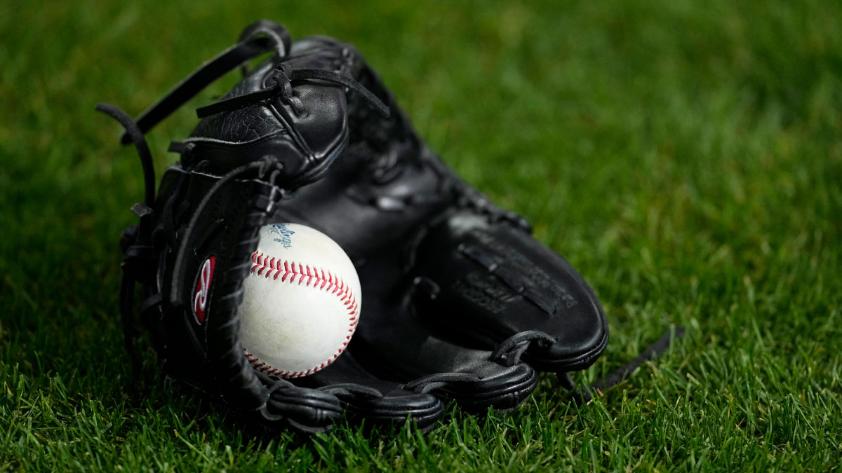 https://wp.clutchpoints.com/wp-content/uploads/2026/09/Baseball-glove-on-field.jpg