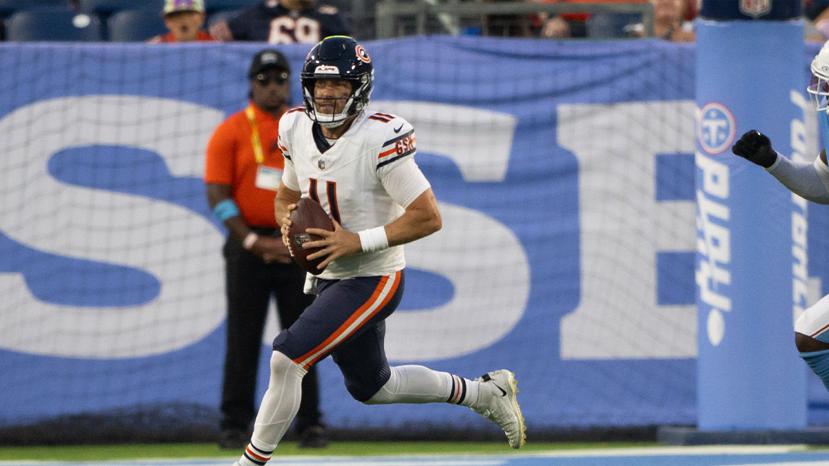 Chicago Bears quarterback Case Keenum (11) rolls out against the Tennessee Titans during the second half at Nissan Stadium. 