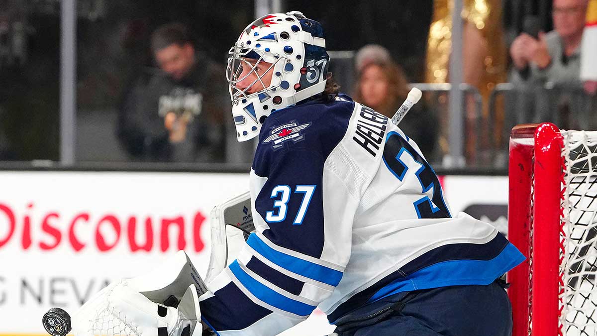 Winnipeg Jets goaltender Connor Hellebuyck (37) warms up before the start of a game against the Vegas Golden Knights at T-Mobile Arena.