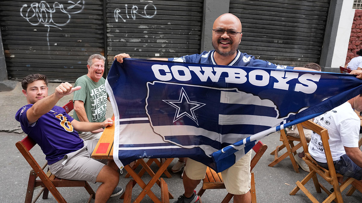 Dallas Cowboys, Baltimore Ravens ad New York Jets fans pose during the 2026 NFL Rio Game at Maracana Stadium.