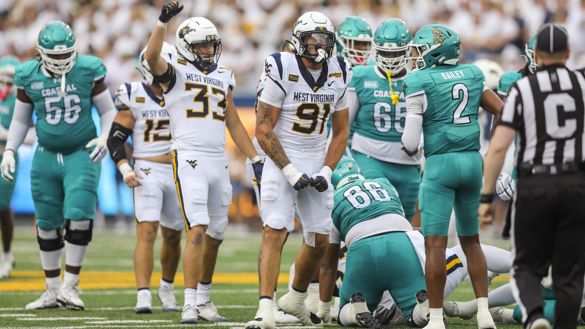 West Virginia d-lineman carted off field with season-threatening lower-body injury