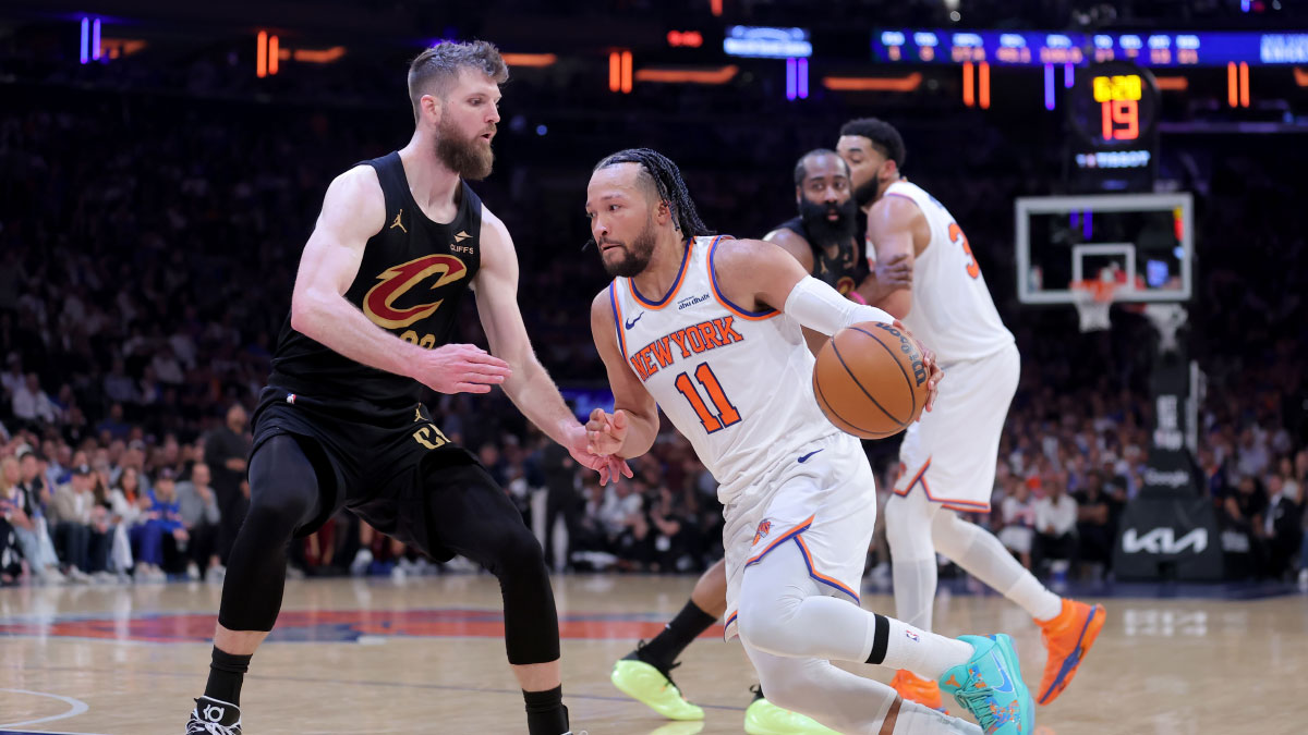 New York Knicks guard Jalen Brunson (11) drives to the basket against Cleveland Cavaliers forward Dean Wade (32) during the third quarter of game one of the eastern conference finals during the 2026 NBA playoffs at Madison Square Garden.
