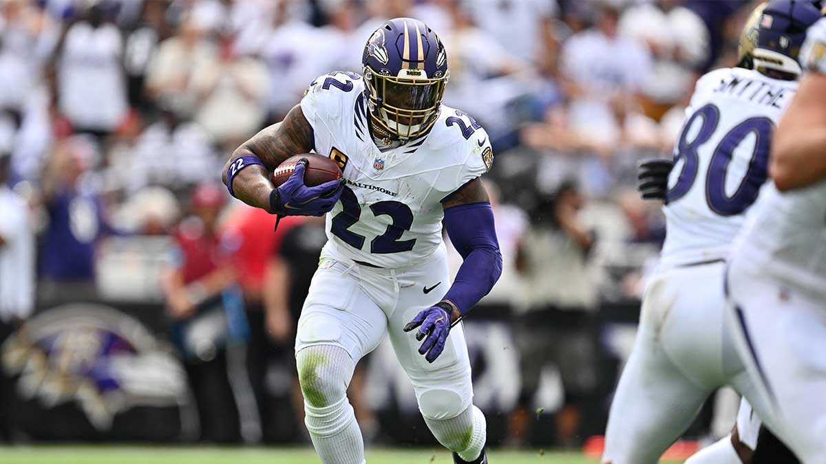 Baltimore Ravens running back Derrick Henry (22) runs with the ball in the first quarter against the New Orleans Saints at M&T Bank Stadium